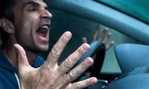 angry-man-yelling-in-car